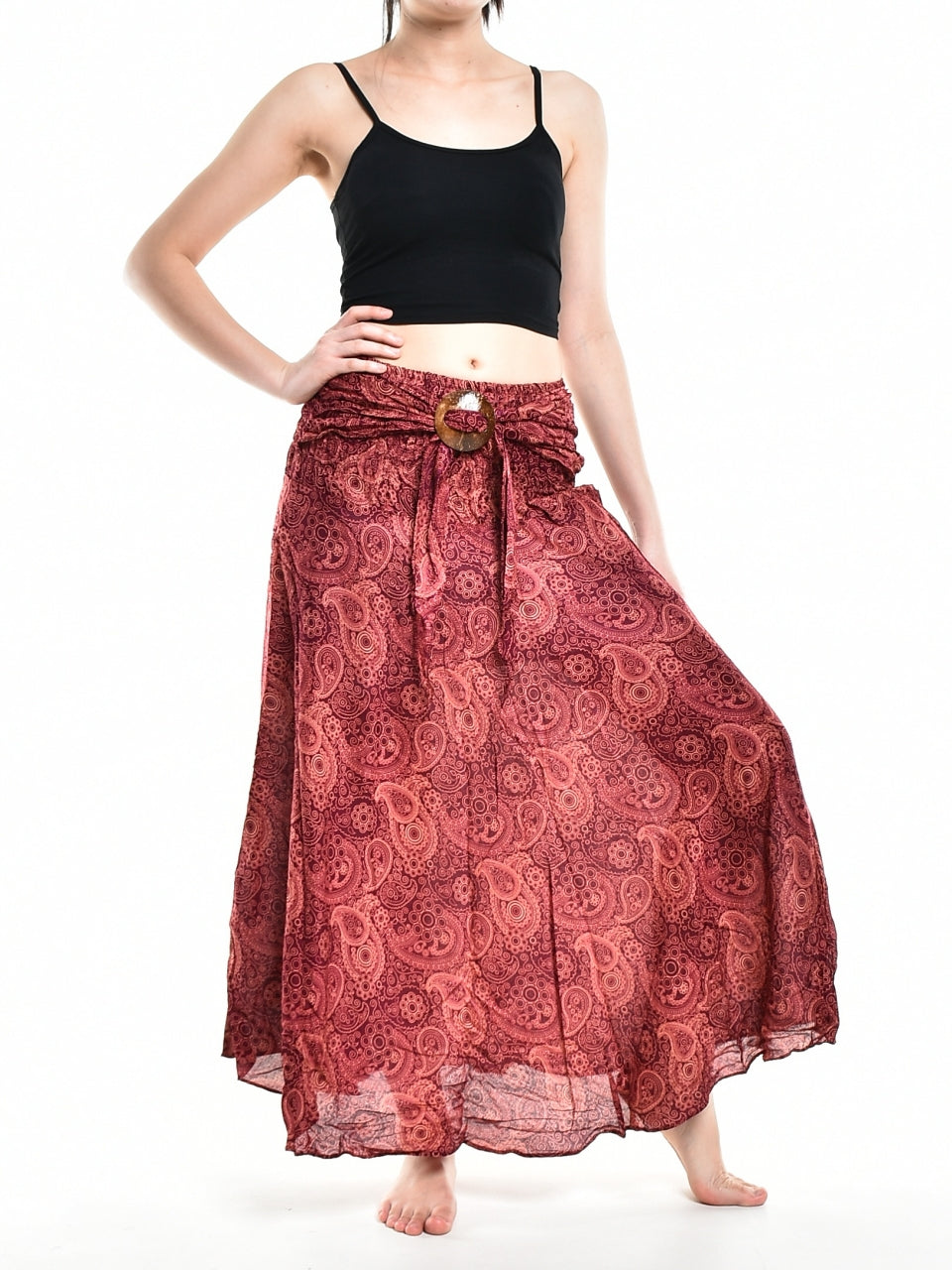 Bohotusk Red Orbit Long Skirt featuring a coconut buckle, showcasing its flowing design and elasticated smocked waist.